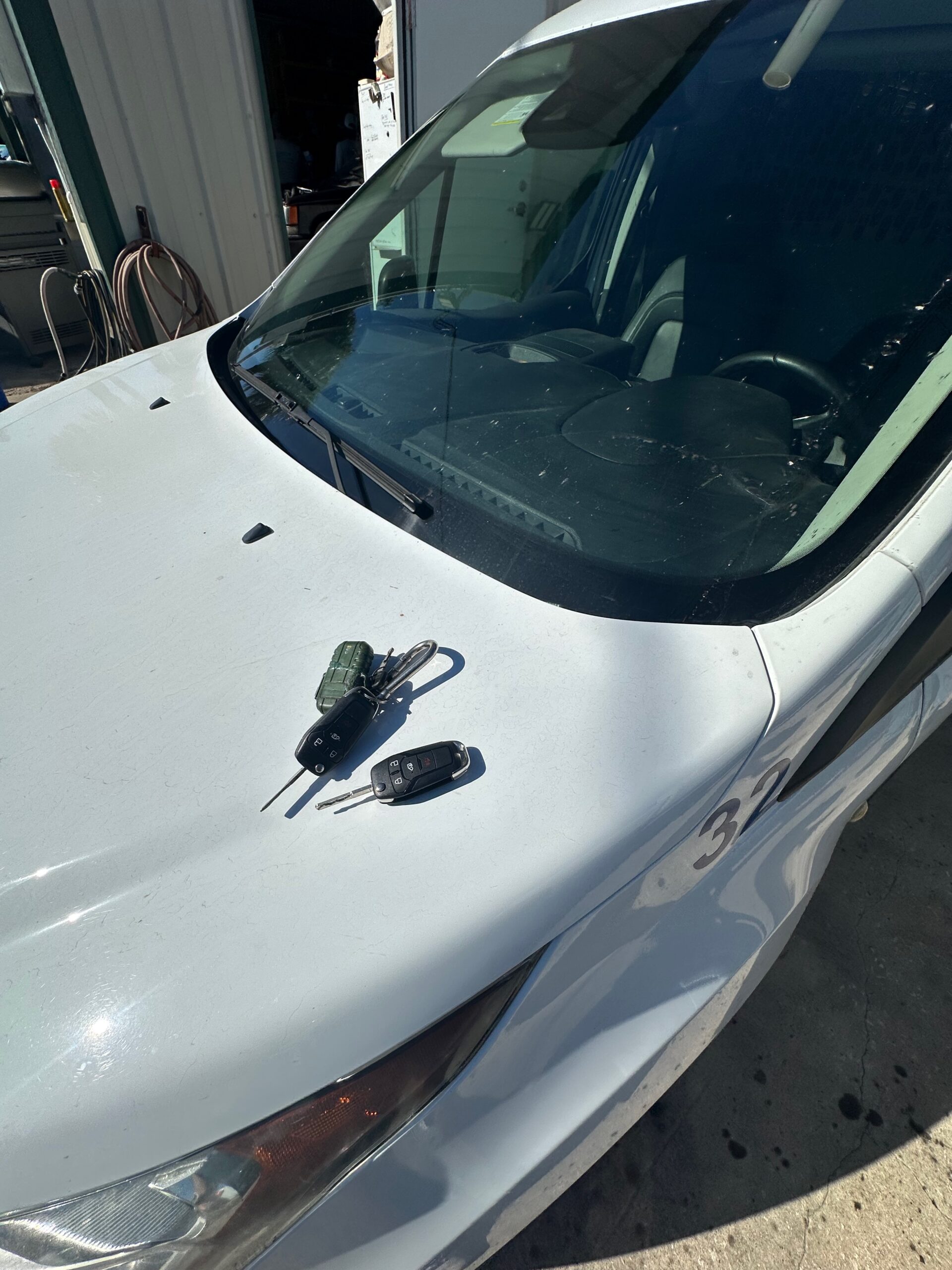 Car keys left on vehicle hood during an emergency lockout in Melbourne FL